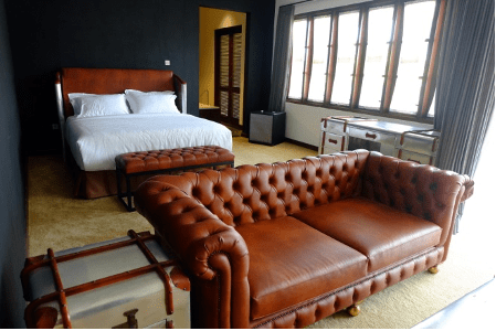 Dreamy Loft Kamar hotel bertema industrial Belle Crown Jasa Website Malang jasawebmalang.com